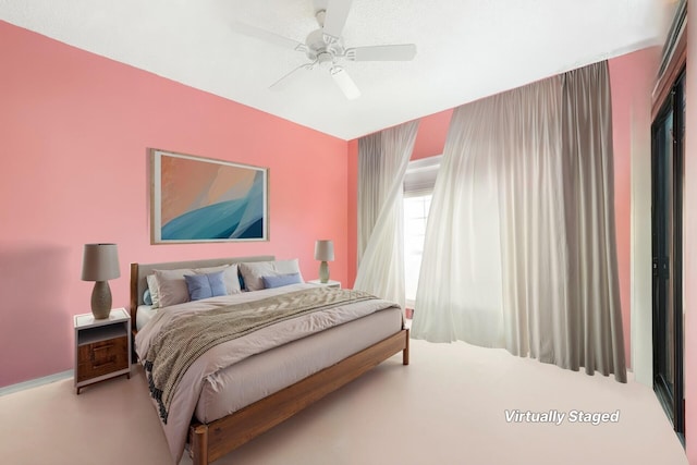 6941 SE Constitution Blvd Unit 101, Hobe Sound, FL 33455 - bedroom with ceiling fan