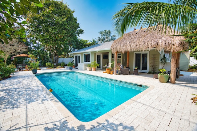 view of pool featuring fence, a patio area, and a fenced in pool