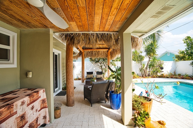 view of patio / terrace with a fenced in pool and a fenced backyard