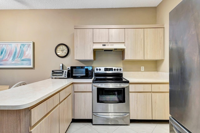 kitchen featuring light brown cabinetry, a peninsula, under cabinet range hood, and stainless steel appliances