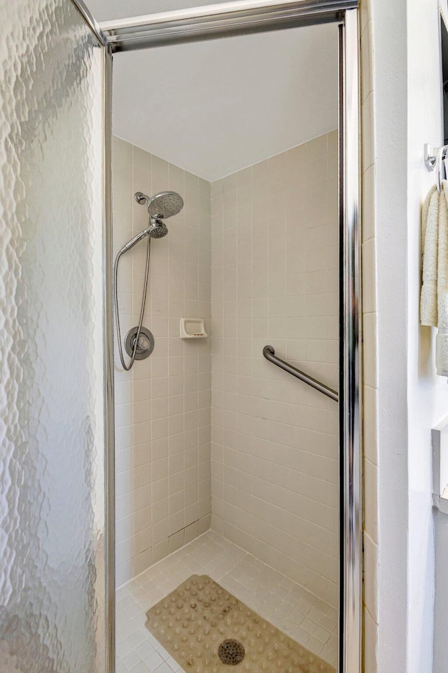 bathroom featuring a stall shower