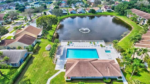 aerial view featuring a residential view and a water view