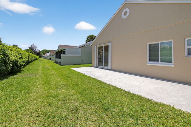 7848 Mansfield Hollow Rd, Delray Beach, FL 33446 - view of green lawn with a patio area