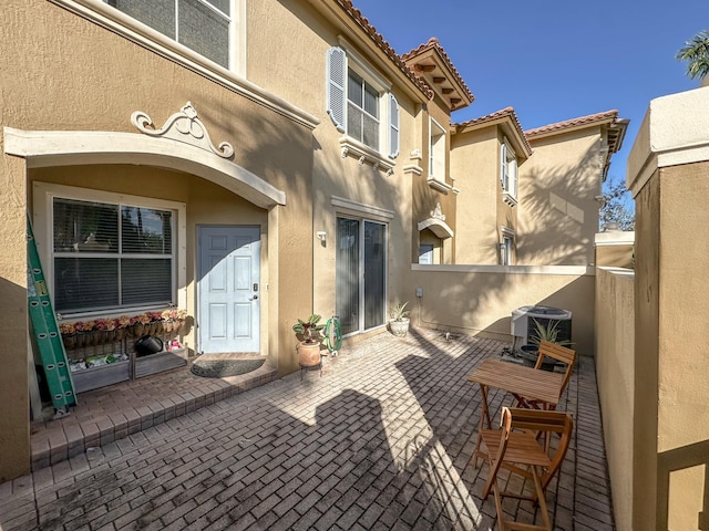 view of patio with cooling unit