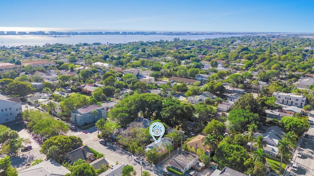 aerial view with a residential view and a water view