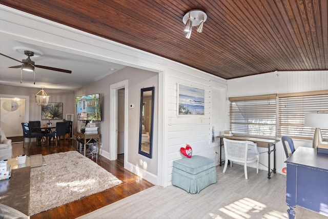 home office featuring wooden ceiling, baseboards, ceiling fan, and wood finished floors