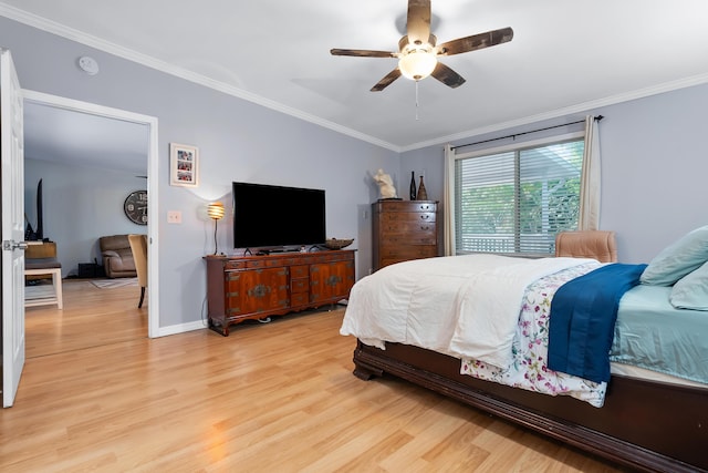 bedroom with ceiling fan, baseboards, ornamental molding, and light wood finished floors