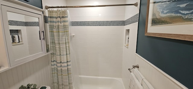 bathroom with shower / bathtub combination with curtain