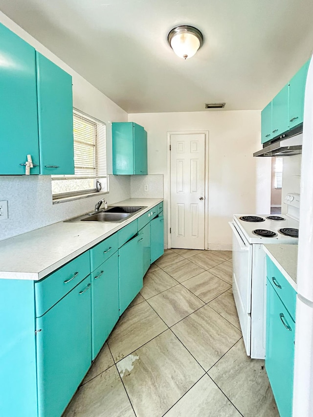 kitchen with visible vents, under cabinet range hood, light countertops, white electric range, and a sink