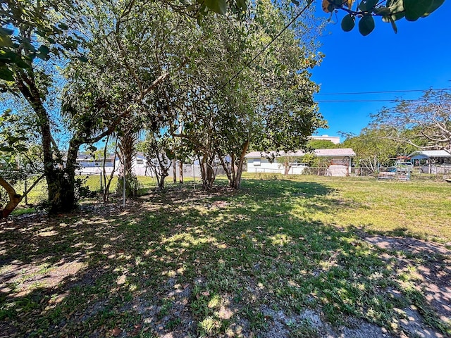 view of yard featuring fence