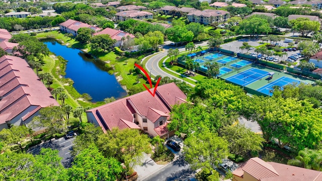 bird's eye view featuring a residential view and a water view