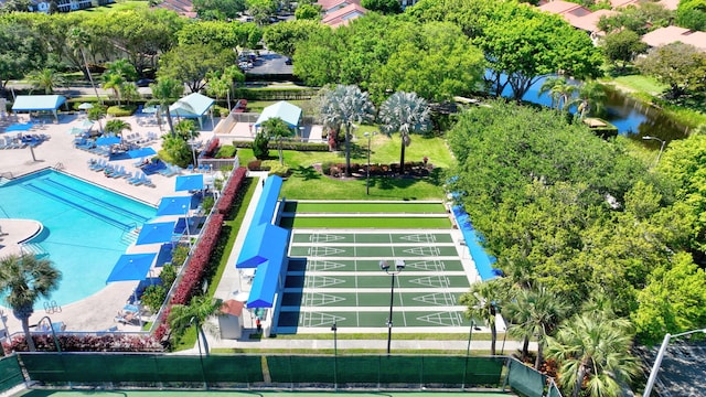 birds eye view of property with a water view