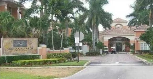 view of street with traffic signs and curbs