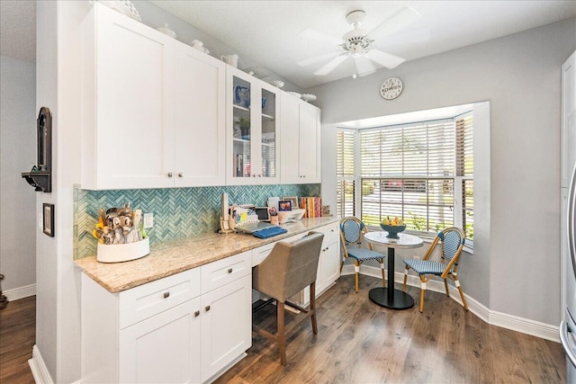 dining room with a textured ceiling, baseboards, visible vents, and a chandelier