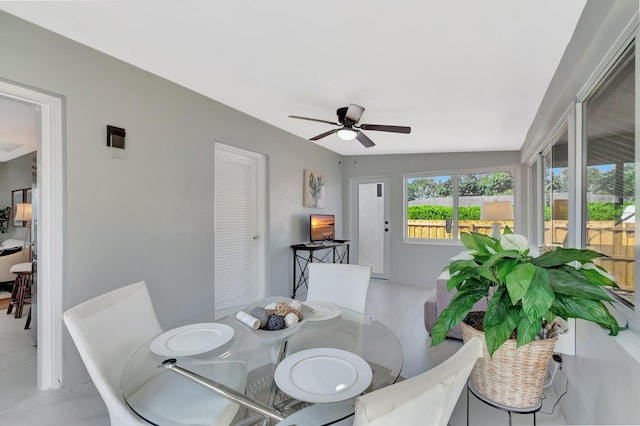 dining room with a ceiling fan