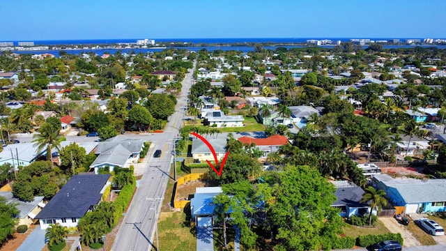 birds eye view of property with a residential view