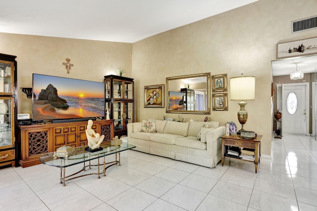 tiled living area featuring visible vents