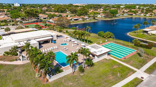 bird's eye view featuring a residential view and a water view