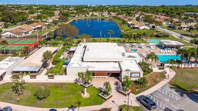 aerial view featuring a water view and a residential view