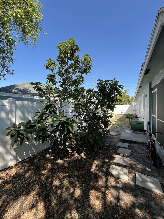 view of yard featuring a patio and a fenced backyard