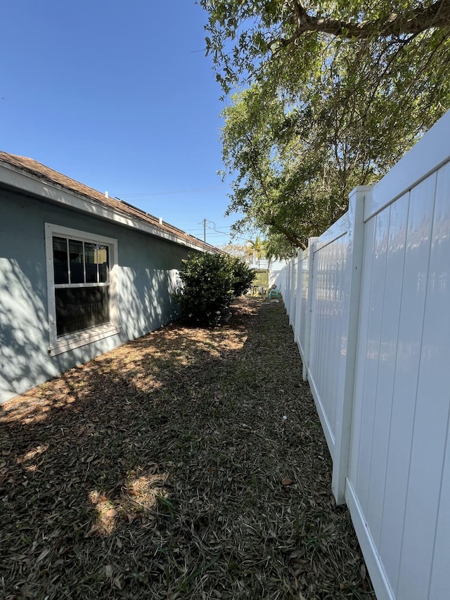 view of yard with fence