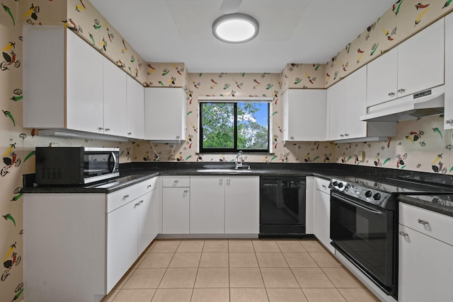 kitchen featuring black appliances, under cabinet range hood, a sink, dark countertops, and white cabinetry