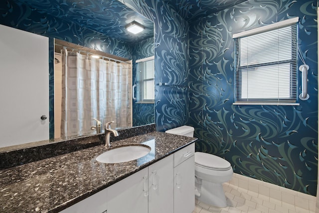 bathroom with tile patterned flooring, wallpapered walls, toilet, a shower with shower curtain, and vanity