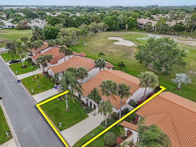 birds eye view of property with a residential view and golf course view