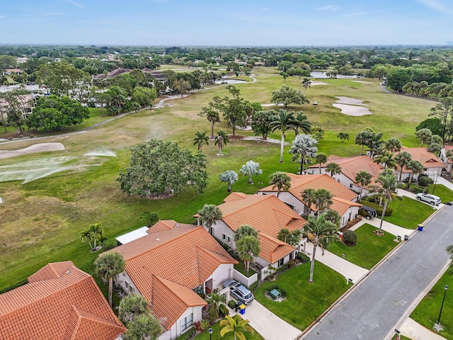 aerial view featuring a residential view and view of golf course