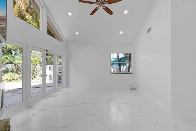 unfurnished room with visible vents, high vaulted ceiling, recessed lighting, ceiling fan, and marble finish floor