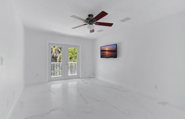 empty room with visible vents, baseboards, ceiling fan, french doors, and marble finish floor