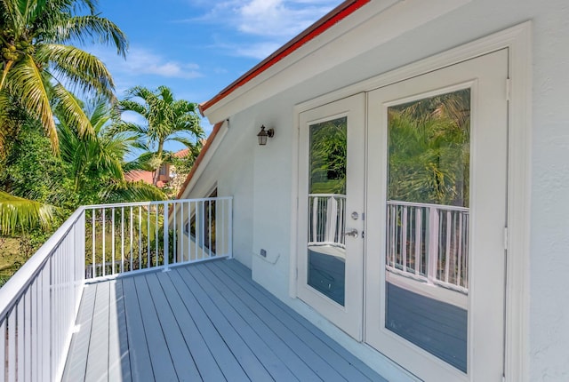 wooden deck featuring french doors