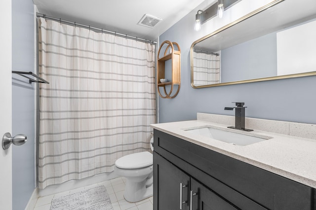 bathroom featuring tile patterned flooring, visible vents, toilet, and vanity