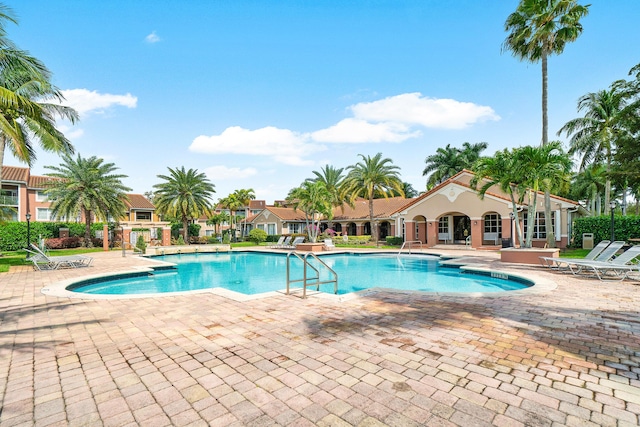 community pool featuring a patio