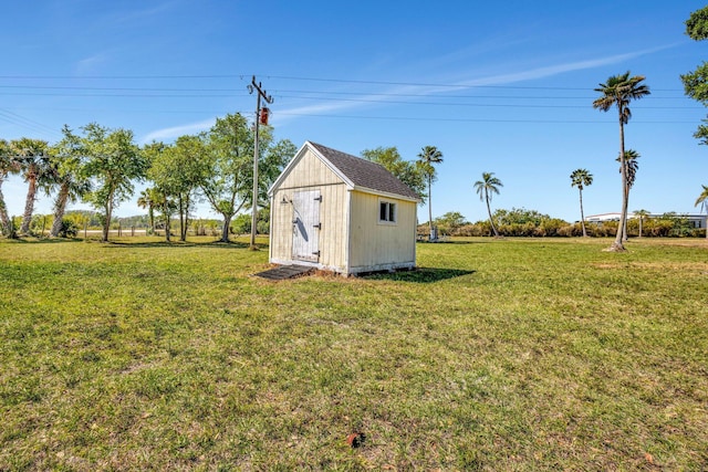 view of yard with a shed and an outdoor structure