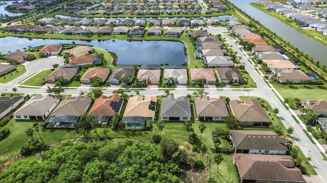12093 SW Marigold Ave, Port Saint Lucie, FL 34987 - aerial view of property's location featuring nearby suburban area and a large body of water