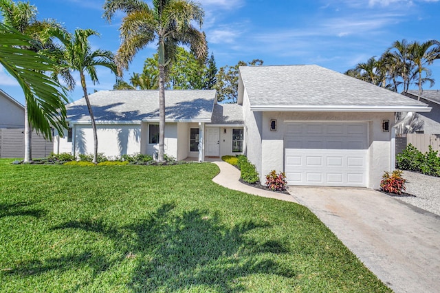 ranch-style house featuring stucco siding, a garage, concrete driveway, and a front yard