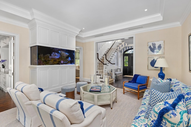 living room with crown molding, stairway, recessed lighting, and light wood finished floors