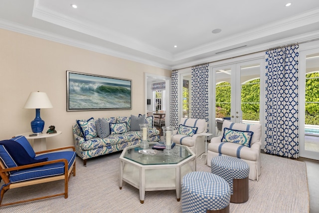 living area with recessed lighting, french doors, and ornamental molding