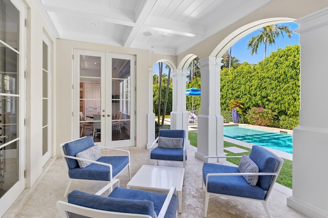 view of patio with an outdoor pool and french doors