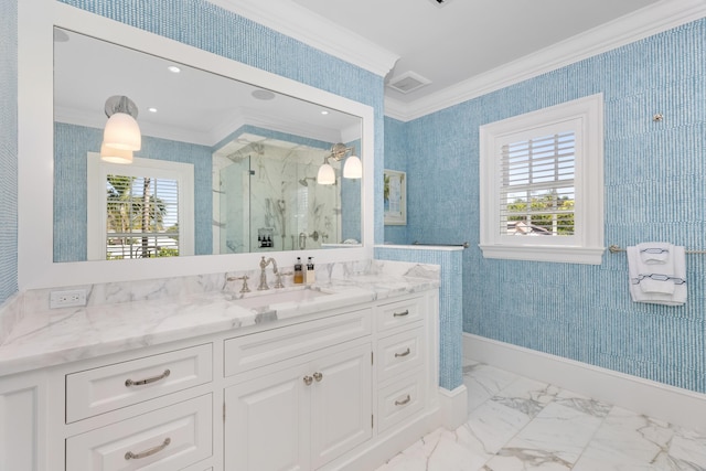 full bath featuring a wealth of natural light, a marble finish shower, marble finish floor, and crown molding