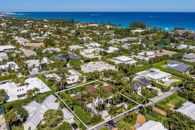 bird's eye view with a residential view and a water view