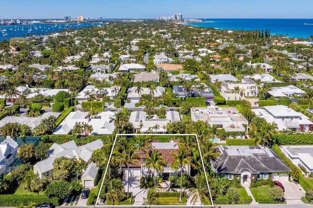 aerial view with a residential view and a water view