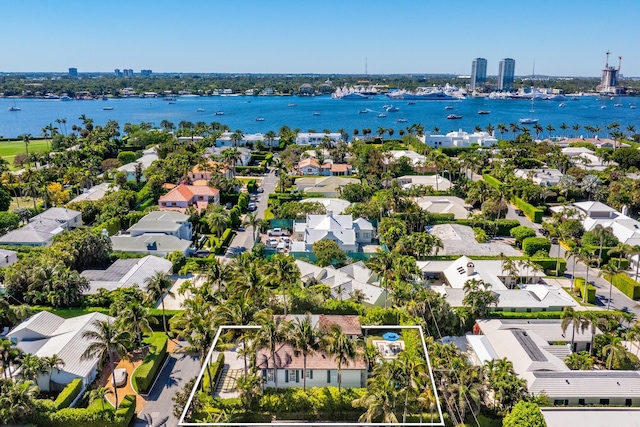 aerial view with a residential view and a water view