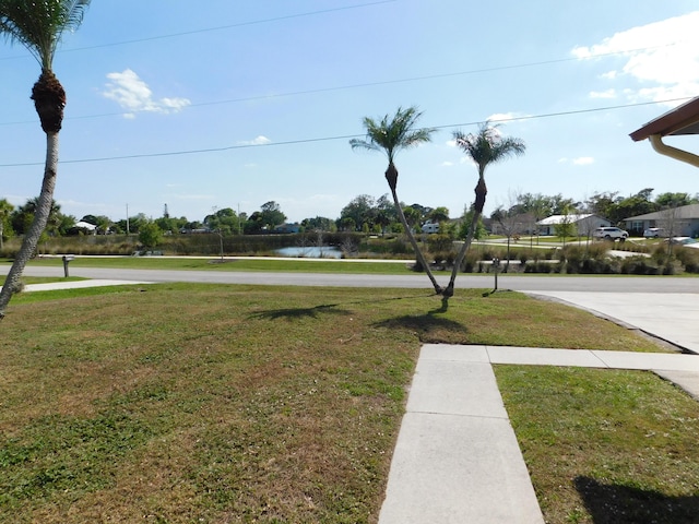 view of yard with a water view