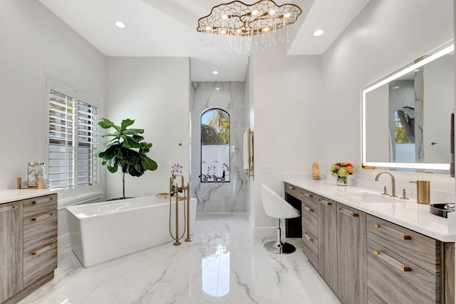 full bath with recessed lighting, a marble finish shower, marble finish floor, and vanity