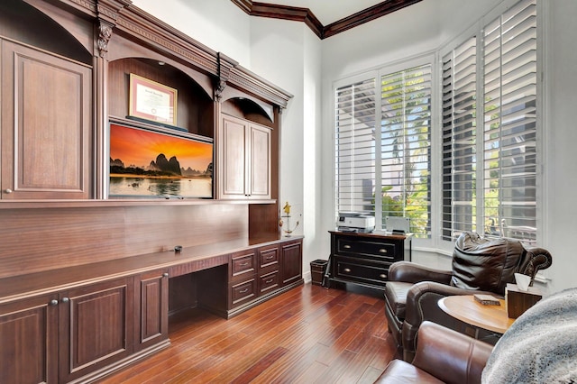 office area with ornamental molding and dark wood-style flooring