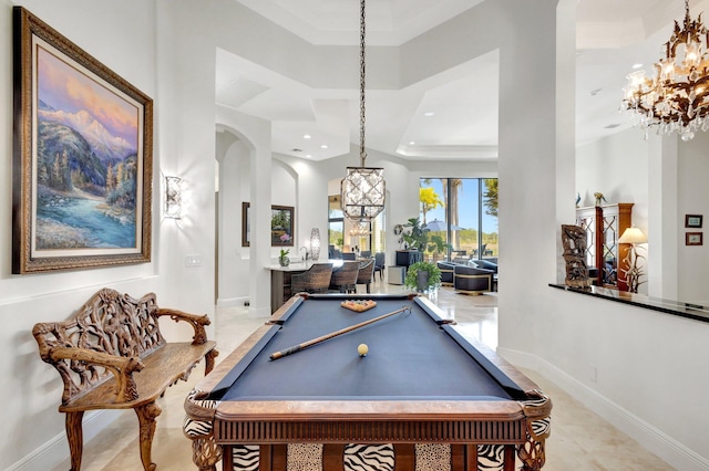 recreation room featuring pool table, baseboards, recessed lighting, arched walkways, and a notable chandelier