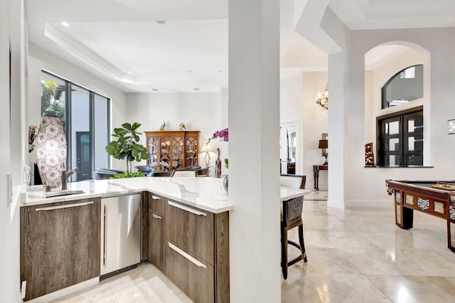 bar with baseboards, dishwashing machine, recessed lighting, billiards, and a sink