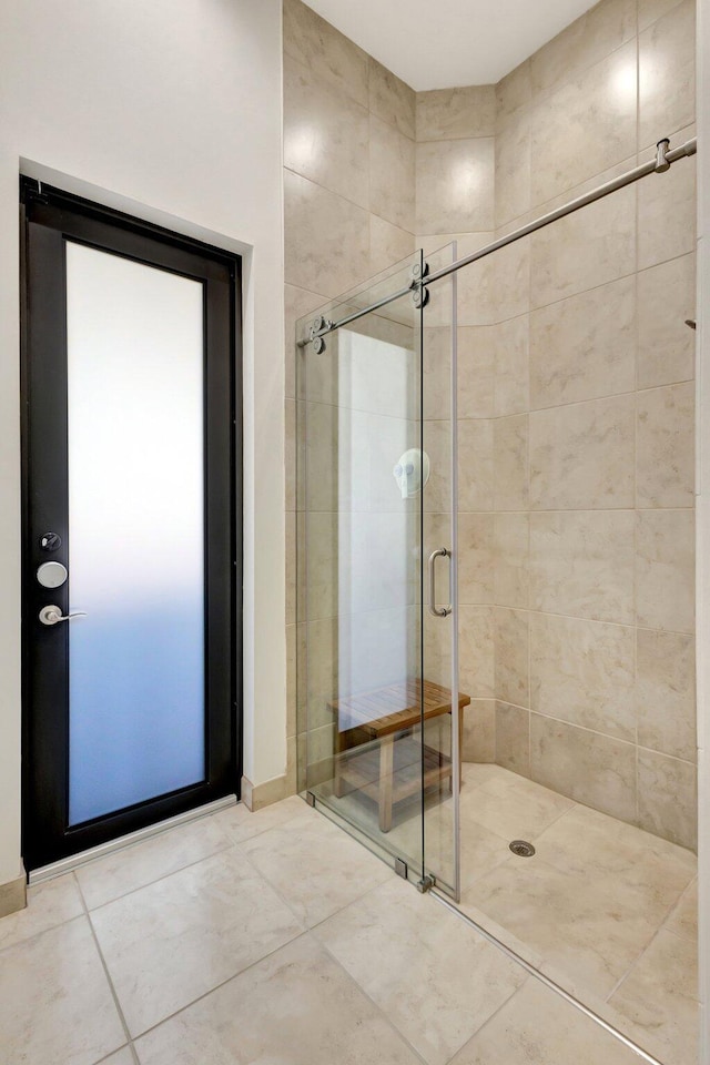 full bathroom featuring a shower stall